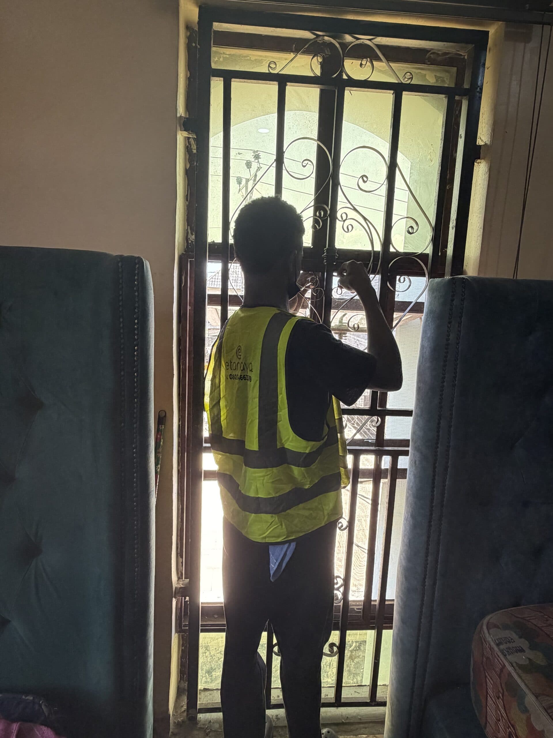 Close work on the window security grille